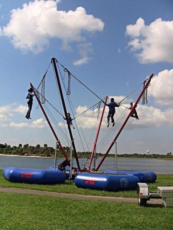 Fungee Bungee Rides Bungee Trampoline 4 Station Rentals - Extravaganza Entertainment LLC
